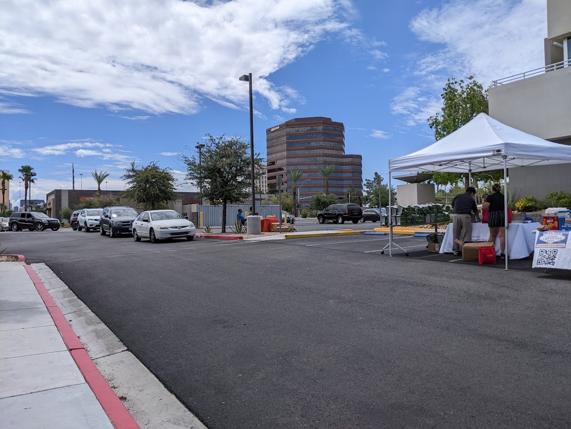 Cars lined up for the drive-through Back to School distribution
